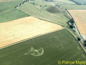 July 7th 2013 at first sign of English summer, largest manmade mound in Europe, Silbury Hill attracts Ship of Dreams crop circle